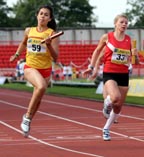 Sydney Robertson brings Northumberland home first in the Junior Girls 4x100 metres relay at the 2011 Aviva English Schools' 81st Track and Field Championships, Gateshead International Stadium